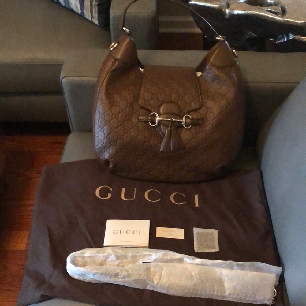 Brown guccissima leather with brown leather trim